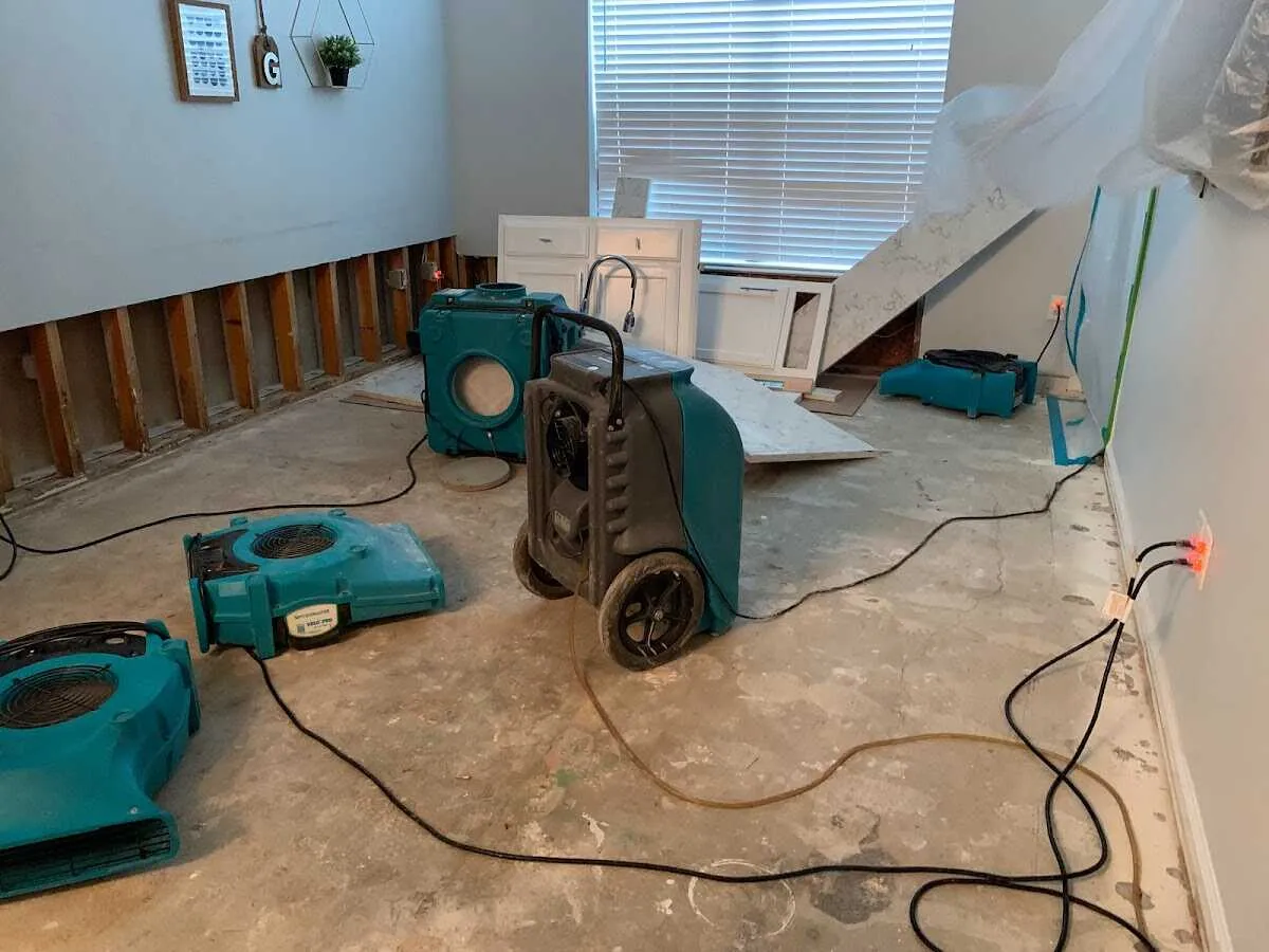 Dehumidifier in flood-cut room for Water Damage Restoration in Oakwood
